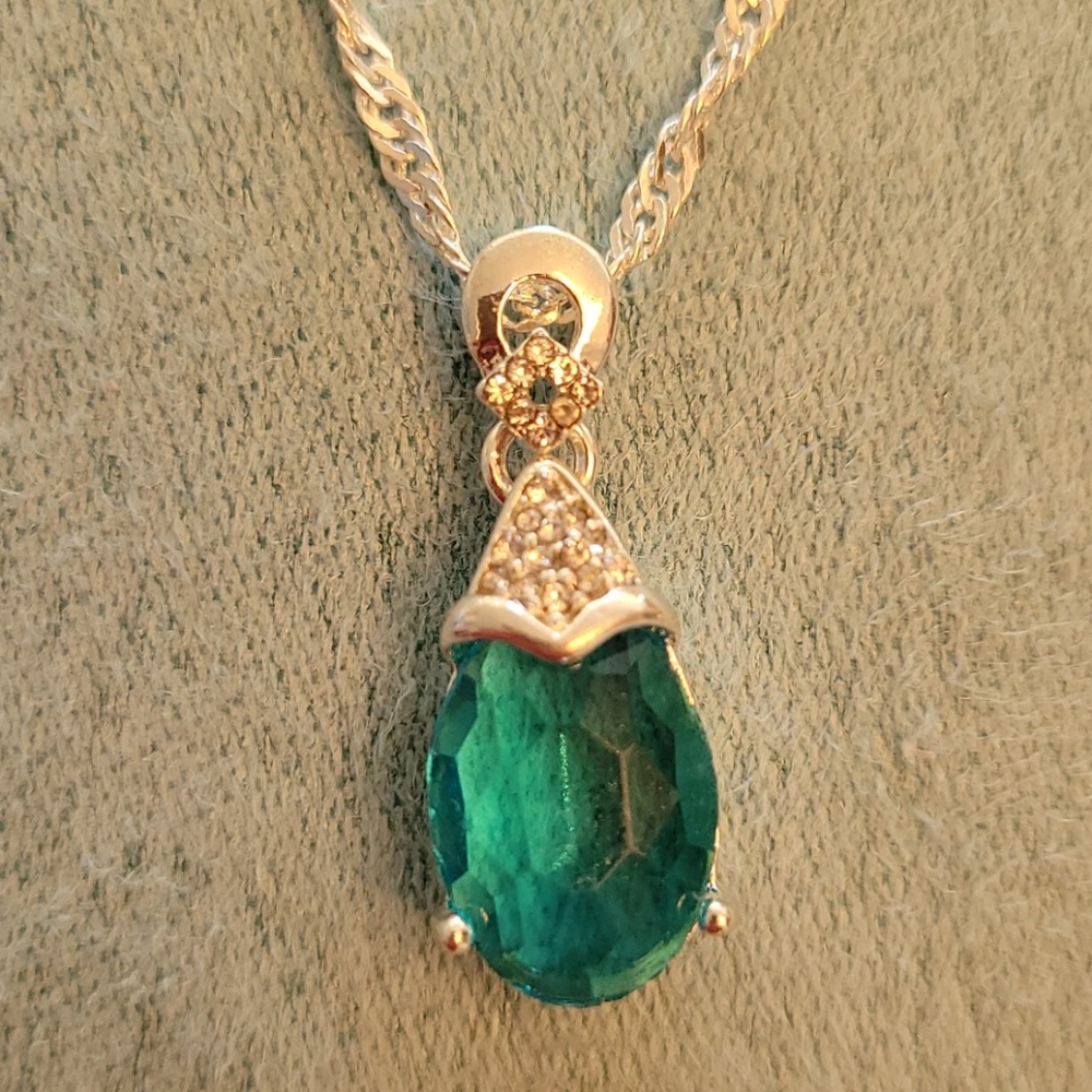 Silver Necklace with Blue Topaz Teardrop P…